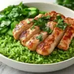 Peruvian arroz con pollo served in a white bowl.